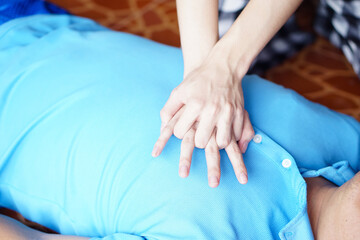 Close up hands  pump on chest for first aid emergency CPR of unconscious man. Concept, Heath care,...
