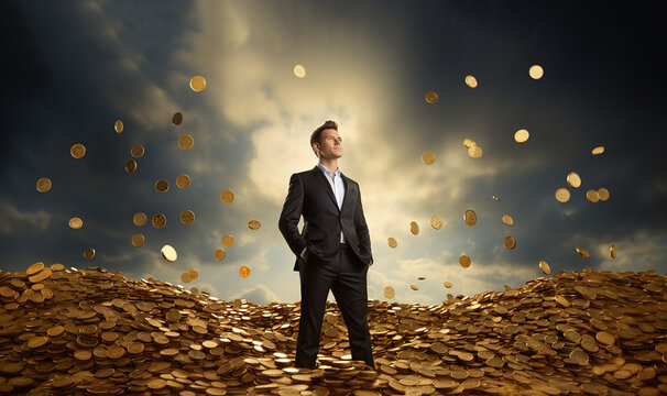 Successful businessman walking on gold coins, business,money,finance,business growth concept leadership and success background with copy space
