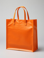 An orange paper hand-held packaging bag with copy space and isolated background