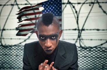 african american rapper with the american flag and barbed wire