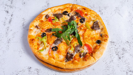 Beef pizza with olives