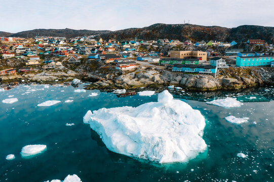 The arctic town of Ilulissat in Greenland by the ocean coast
