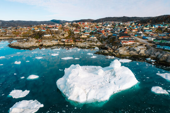 The arctic town of Ilulissat in Greenland by the ocean coast