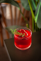 Festive pink cocktail with champagne or prosecco with ice