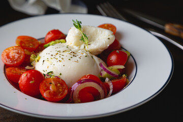 Salad with cherry tomatoes and burrata