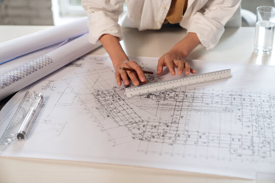 Young designer of interior drawings