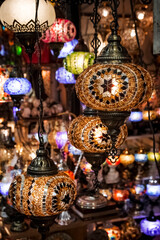 display of typical and colorful Turkish glass and bronze lamps