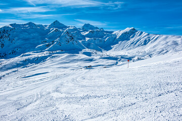 Fototapeta na wymiar Ski slopes on the mountains around Bormio Ski resort