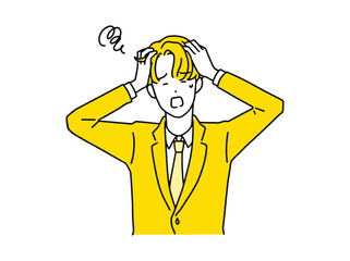 頭を抱えて悩む男性・ビジネスマン