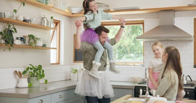Crazy, happy family and parents dancing with kids or playing in a kitchen together and excited for a meal in a home. Tutu, mother and father with energy bonding with children love, care and happiness