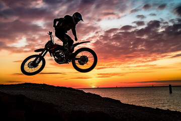 Fototapeta na wymiar silhouette of a cyclist on sunset generative AI