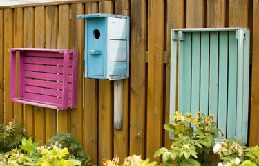 New colorful birdhouses in vintage style. Make handmade bird nests yourself