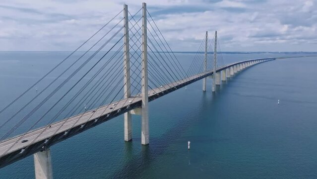 Panoramic aerial close up view of Oresund bridge over the Baltic sea between Malmo city in Sweden and Copenhagen in Denmark.