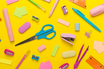 Flat lay with colorful school stationery on color backgroung, top view