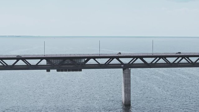 Panoramic aerial close up view of Oresund bridge over the Baltic sea between Malmo city in Sweden and Copenhagen in Denmark.