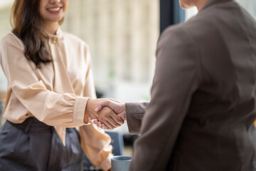 Close up of businesswoman shaking hands during a meeting success, dealing, greeting and partner...