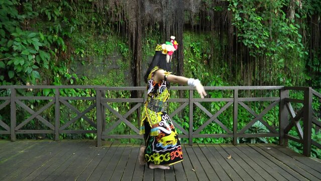 A Borneo lady showcasing the beauty of her culture through her stunning traditional clothing