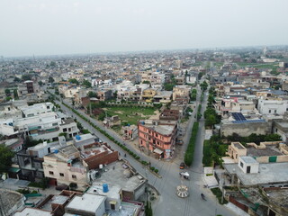 Fototapeta na wymiar Non edited original high angle view of residential area with drone of cantt Lahore, Pakistan.