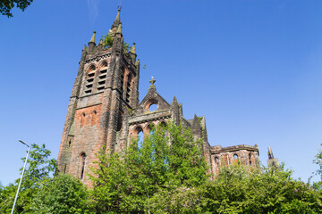 Derelict of Dundyvan Parish Church in Coatbridge, Scotland. Fire Damaged Striking Gothic style Scots Revival church in red sandstone