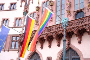 Rainbow flag on Römerberg City Hall downtown Frankfurt, fight for sexual diversity, participants of international LGBT movement, against discrimination and attacks on queer people