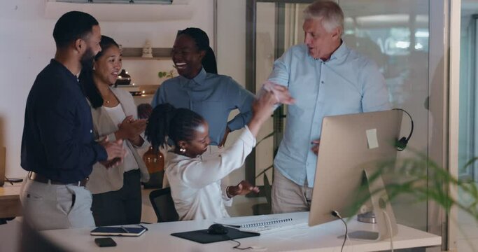 Success, teamwork and business people high five on computer in office for project, planning and strategy. Corporate, collaboration and men and women with victory, celebration and cheering at night
