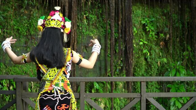 A Borneo lady showcasing the beauty of her culture through her stunning traditional clothing