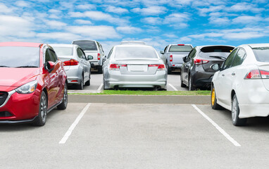 Cars parking in a row in stock background. Vehicle transportation trip inventory merchandise. Car...