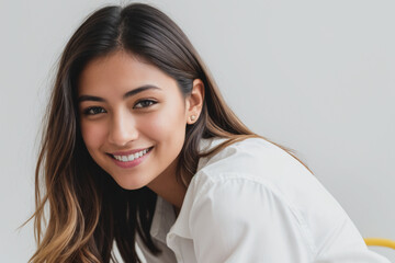 Woman wearing white shirt, smiling, on yellow background. Generative AI