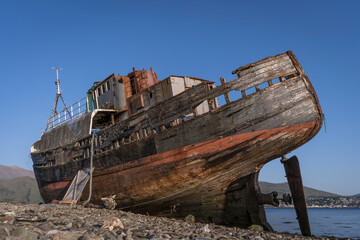 Abandoned fish trawler on the shore of Loch Linnhe.