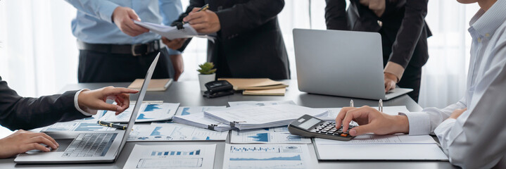 Auditor team collaborate in office, analyzing financial data and accounting record. Expertise in...