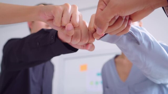 Business people join hand together. People joining for cooperation success business. Volunteer charity work. Teamwork concept.