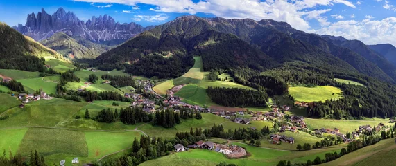 Foto op Canvas Stunning Alpine scenery of breathtaking Dolomites rocks mountains in Italian Alps, South Tyrol, Italy. Aerial view of Val di Funes and village Maddalena © Freesurf