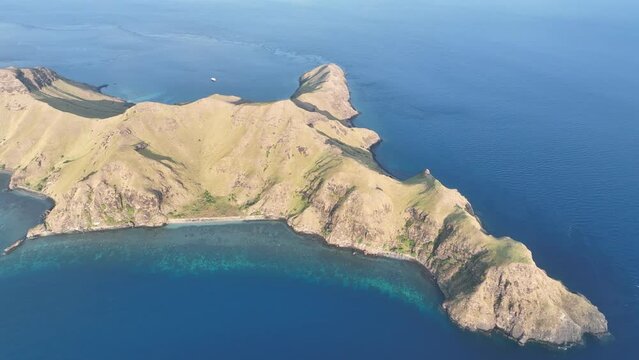 The volcanic island of Gili Banta, not far from Komodo National Park, is surrounded by healthy coral reefs. This beautiful area of Indonesia is known for its astounding marine biodiversity.