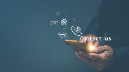 Contact us or hotline customer information support connect, Businessman using mobile phone and...