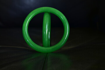 Jade is a green jade bangle. as an ornament