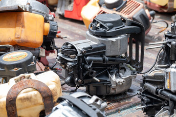 The engine of the old lawn mower is a household item, the small engine while being modified to...