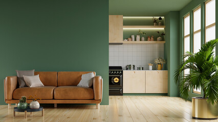 Living room interior green wall mockup in warm tones with leather sofa which is behind the kitchen. © Vanitjan