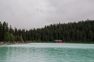 Fototapeta na wymiar Summer vacation - panorama of Lake Louise, Banff National Park, Alberta, Canada. . Rocky Mountain. A tourist magnet - lake landscape panorama Active recreation - canoeing, kayaking, water sport