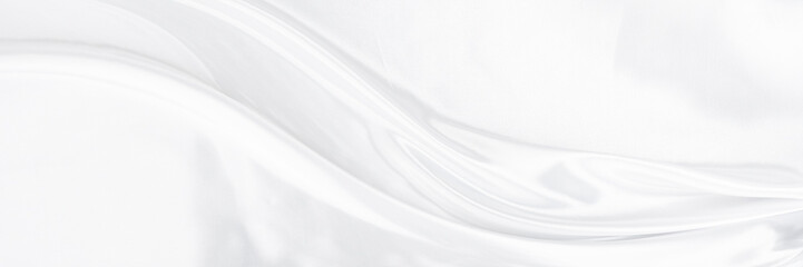 Obraz na płótnie Canvas White gray satin texture that is white silver fabric silk panorama background with beautiful soft blur pattern natural.
