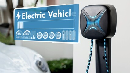 EV car recharging battery from home charging station and display digital smart battery hologram graphic. Future innovative EV car and technological advancement of energy sustainability. Peruse