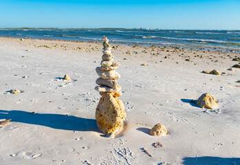 life equilibrium. balance and harmony in life. harmony and balance. zen pebble at beach. nature...