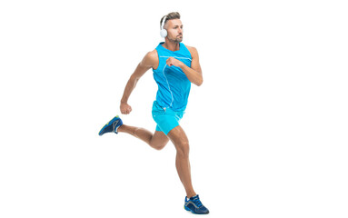 The jogger warmed legs before running. sport jogger listen to music in headphones. The jogger ran at sport training isolated on white. In a morning sport workout jogger run in studio