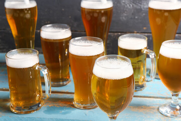 Glasses and mugs of cold beer on table. Oktoberfest celebration