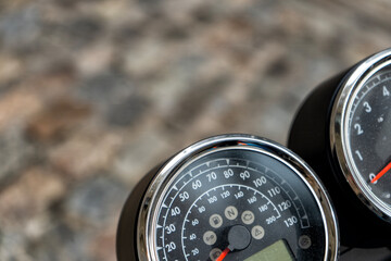 Motorcycle gauges on a blurry background - 623945838