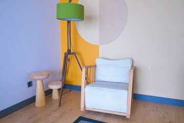 retro vantage armchairs with a lamp at home .