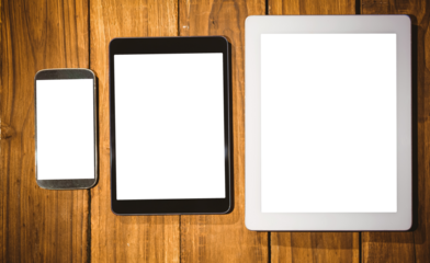 Digital png illustration of smartphone and tablets on wood on transparent background