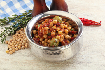 Chickpea beans with dry tomato and olives