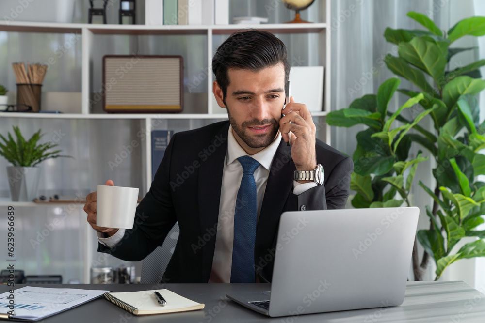 Aufkleber diligent businessman busy talking on the phone call with clients while working with laptop in his of
