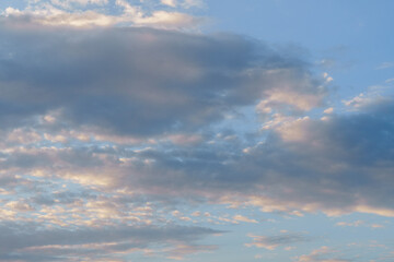Naklejka na ściany i meble dramatic cloudy sky with sun rays photographic background