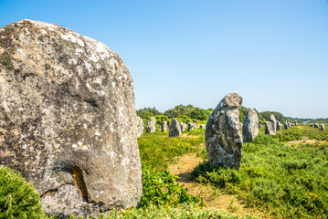 Carnac stones are an exceptionally dense collection of megalithic sites near the south coast of Brittany in northwestern France - 623977611